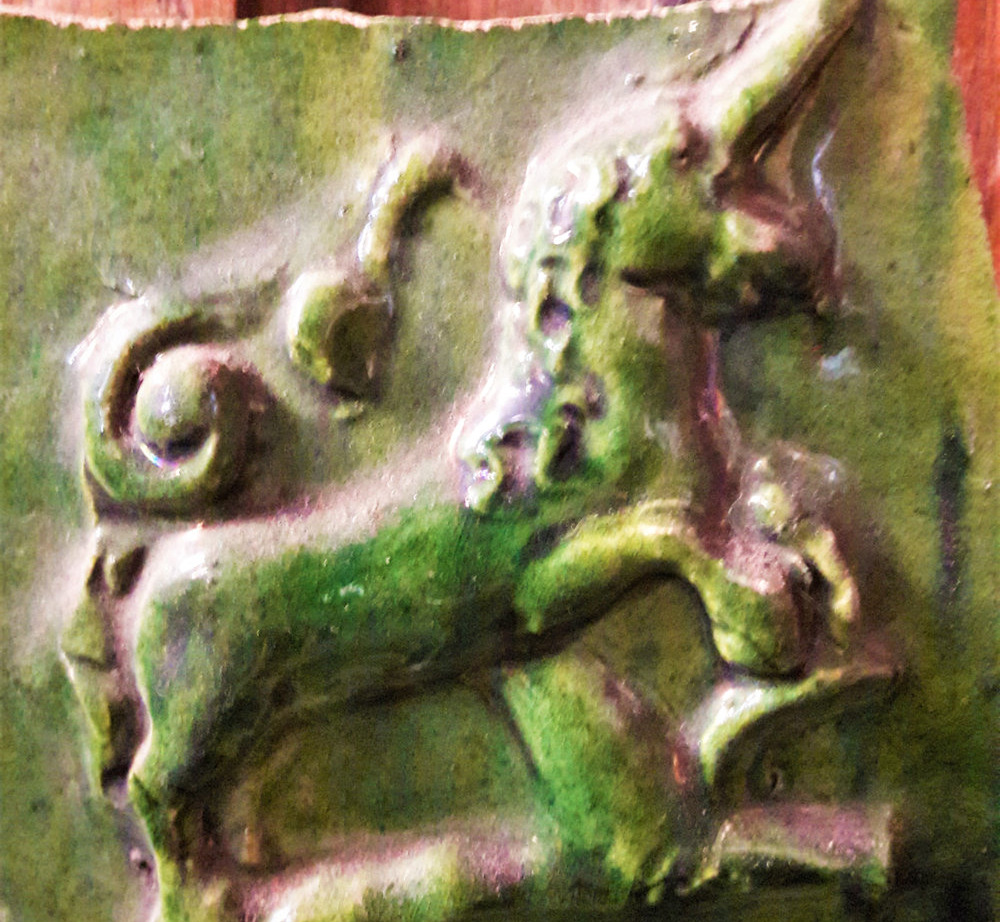 A Fire-cover or curfew (unicorn detail)